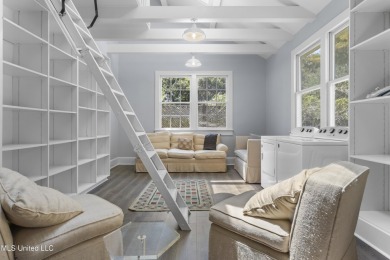 Step into the timeless charm of this beautifully preserved on Pass Christian Isles Golf Club in Mississippi - for sale on GolfHomes.com, golf home, golf lot