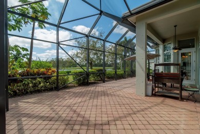 The panoramic view of the lake and golf course welcomes you the on Ironhorse Country Club in Florida - for sale on GolfHomes.com, golf home, golf lot