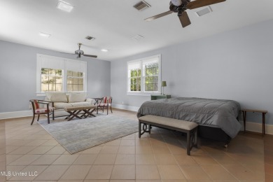Step into the timeless charm of this beautifully preserved on Pass Christian Isles Golf Club in Mississippi - for sale on GolfHomes.com, golf home, golf lot