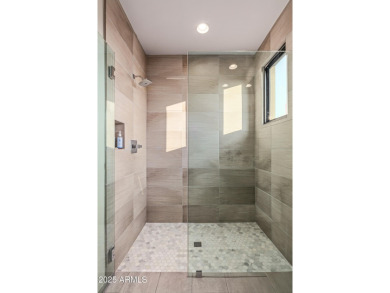 A striking example of contemporary design, this single-level on Desert Mountain Golf Club - Renegade Course in Arizona - for sale on GolfHomes.com, golf home, golf lot