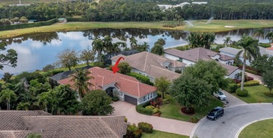 The panoramic view of the lake and golf course welcomes you the on Ironhorse Country Club in Florida - for sale on GolfHomes.com, golf home, golf lot