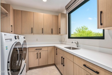 A striking example of contemporary design, this single-level on Desert Mountain Golf Club - Renegade Course in Arizona - for sale on GolfHomes.com, golf home, golf lot