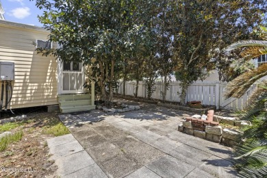 Step into the timeless charm of this beautifully preserved on Pass Christian Isles Golf Club in Mississippi - for sale on GolfHomes.com, golf home, golf lot