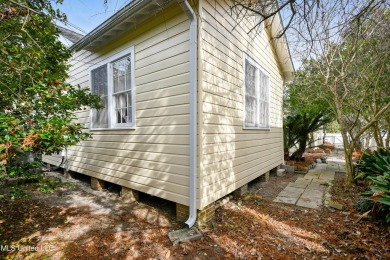 Step into the timeless charm of this beautifully preserved on Pass Christian Isles Golf Club in Mississippi - for sale on GolfHomes.com, golf home, golf lot