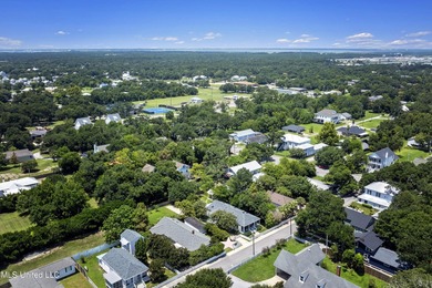 Step into the timeless charm of this beautifully preserved on Pass Christian Isles Golf Club in Mississippi - for sale on GolfHomes.com, golf home, golf lot
