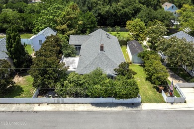 Step into the timeless charm of this beautifully preserved on Pass Christian Isles Golf Club in Mississippi - for sale on GolfHomes.com, golf home, golf lot
