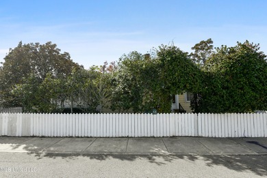 Step into the timeless charm of this beautifully preserved on Pass Christian Isles Golf Club in Mississippi - for sale on GolfHomes.com, golf home, golf lot