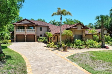 Located on the 9th Fairway in the Estate Home section of the on Halifax Plantation Golf Club in Florida - for sale on GolfHomes.com, golf home, golf lot