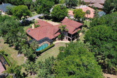 Located on the 9th Fairway in the Estate Home section of the on Halifax Plantation Golf Club in Florida - for sale on GolfHomes.com, golf home, golf lot