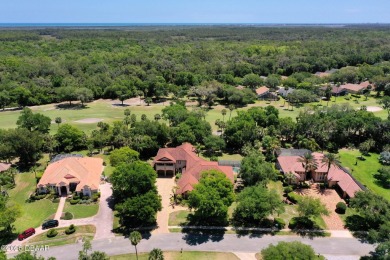 Located on the 9th Fairway in the Estate Home section of the on Halifax Plantation Golf Club in Florida - for sale on GolfHomes.com, golf home, golf lot