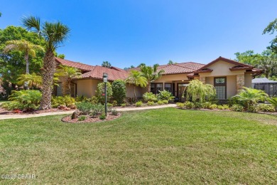 Located on the 9th Fairway in the Estate Home section of the on Halifax Plantation Golf Club in Florida - for sale on GolfHomes.com, golf home, golf lot