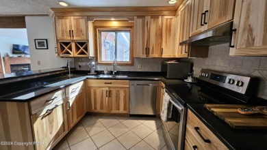 Beautiful Upgrades in this Spacious, Well Kept, Turnkey, FULLY on Lake Naomi Timber Trails Golf Club in Pennsylvania - for sale on GolfHomes.com, golf home, golf lot
