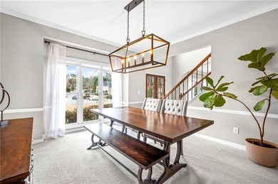 Welcome home to this 6-bedroom, 4-bath home tucked away on a on The Golf Club of Georgia in Georgia - for sale on GolfHomes.com, golf home, golf lot