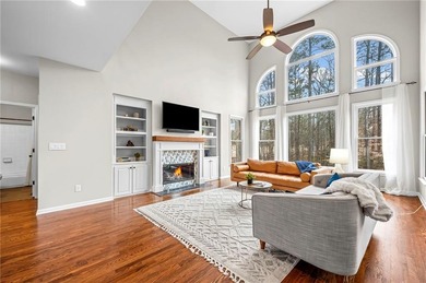 Welcome home to this 6-bedroom, 4-bath home tucked away on a on The Golf Club of Georgia in Georgia - for sale on GolfHomes.com, golf home, golf lot