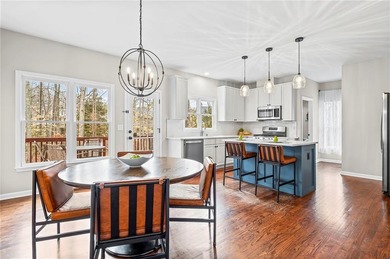 Welcome home to this 6-bedroom, 4-bath home tucked away on a on The Golf Club of Georgia in Georgia - for sale on GolfHomes.com, golf home, golf lot