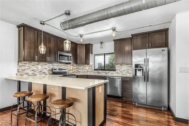 This contemporary top-floor three-bedroom turnkey condominium on The Landings Yacht, Golf and Tennis Club in Florida - for sale on GolfHomes.com, golf home, golf lot