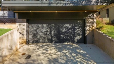 Architectural Masterpiece Overlooking Candler Park Golf Course A on Candler Park Golf Course in Georgia - for sale on GolfHomes.com, golf home, golf lot