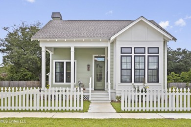 Located in the highly sought-after golf cart district of on Gulf Hills Golf Club in Mississippi - for sale on GolfHomes.com, golf home, golf lot