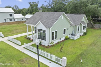 Located in the highly sought-after golf cart district of on Gulf Hills Golf Club in Mississippi - for sale on GolfHomes.com, golf home, golf lot