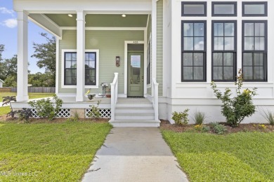 Located in the highly sought-after golf cart district of on Gulf Hills Golf Club in Mississippi - for sale on GolfHomes.com, golf home, golf lot