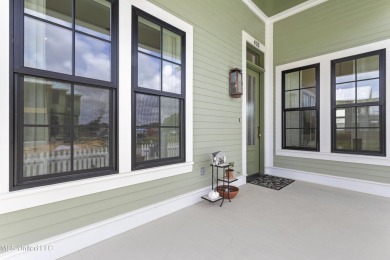 Located in the highly sought-after golf cart district of on Gulf Hills Golf Club in Mississippi - for sale on GolfHomes.com, golf home, golf lot