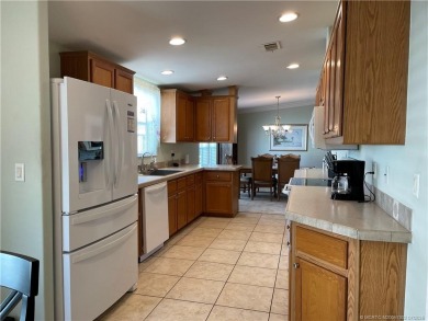 This home truly has it all! 3 bedrooms/2 bath + bonus room on Indianwood Golf and Country Club in Florida - for sale on GolfHomes.com, golf home, golf lot