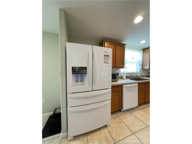 This home truly has it all! 3 bedrooms/2 bath + bonus room on Indianwood Golf and Country Club in Florida - for sale on GolfHomes.com, golf home, golf lot