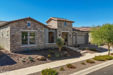 Discover unparalleled luxury in this David Weekley home, located on Verrado Golf Club - Victory in Arizona - for sale on GolfHomes.com, golf home, golf lot