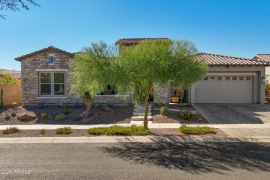 Discover unparalleled luxury in this David Weekley home, located on Verrado Golf Club - Victory in Arizona - for sale on GolfHomes.com, golf home, golf lot