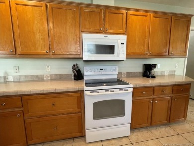 This home truly has it all! 3 bedrooms/2 bath + bonus room on Indianwood Golf and Country Club in Florida - for sale on GolfHomes.com, golf home, golf lot