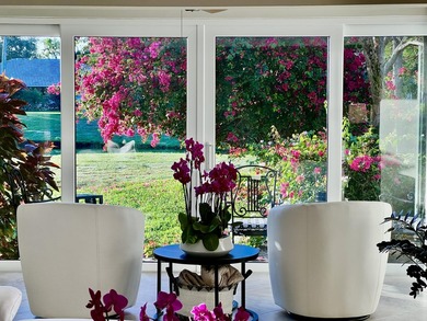 Serene lake views in this beautifully renovated 2-bedroom on Quail Ridge Golf Course and Country Club in Florida - for sale on GolfHomes.com, golf home, golf lot