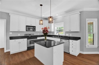 PRICE IMPROVEMENT to reflect cosmetic updates needed. GET INTO on Sedgefield Golf Course in North Carolina - for sale on GolfHomes.com, golf home, golf lot