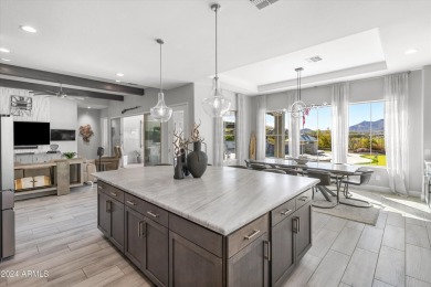 Discover unparalleled luxury in this David Weekley home, located on Verrado Golf Club - Victory in Arizona - for sale on GolfHomes.com, golf home, golf lot