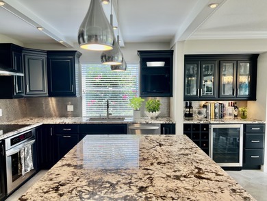 Beautifully renovated 2-bedroom, 2-bath 1st floor corner on Quail Ridge Golf Course and Country Club in Florida - for sale on GolfHomes.com, golf home, golf lot