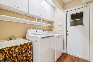 A rare Sun City Center find! This stunning balcony home has on Caloosa Greens Executive Golf Course in Florida - for sale on GolfHomes.com, golf home, golf lot