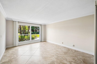 Serene lake views in this beautifully renovated 2-bedroom on Quail Ridge Golf Course and Country Club in Florida - for sale on GolfHomes.com, golf home, golf lot