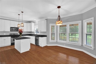 PRICE IMPROVEMENT to reflect cosmetic updates needed. GET INTO on Sedgefield Golf Course in North Carolina - for sale on GolfHomes.com, golf home, golf lot