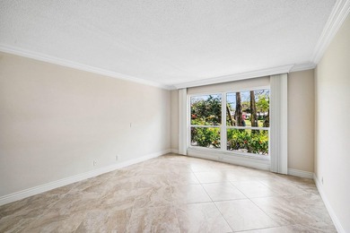 Serene lake views in this beautifully renovated 2-bedroom on Quail Ridge Golf Course and Country Club in Florida - for sale on GolfHomes.com, golf home, golf lot