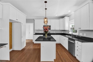 PRICE IMPROVEMENT to reflect cosmetic updates needed. GET INTO on Sedgefield Golf Course in North Carolina - for sale on GolfHomes.com, golf home, golf lot