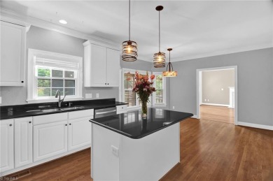 PRICE IMPROVEMENT to reflect cosmetic updates needed. GET INTO on Sedgefield Golf Course in North Carolina - for sale on GolfHomes.com, golf home, golf lot