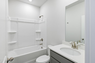 This inviting floor plan is designed for both comfort and on Harbour Point Golf Club in North Carolina - for sale on GolfHomes.com, golf home, golf lot