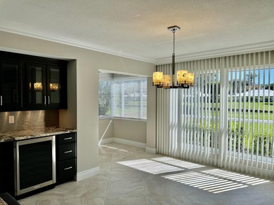 Beautifully renovated 2-bedroom, 2-bath 1st floor corner on Quail Ridge Golf Course and Country Club in Florida - for sale on GolfHomes.com, golf home, golf lot