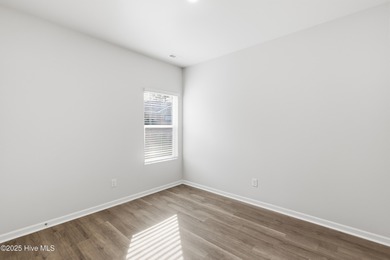 This inviting floor plan is designed for both comfort and on Harbour Point Golf Club in North Carolina - for sale on GolfHomes.com, golf home, golf lot