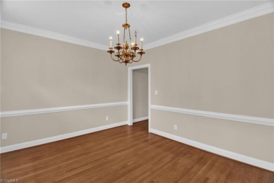 PRICE IMPROVEMENT to reflect cosmetic updates needed. GET INTO on Sedgefield Golf Course in North Carolina - for sale on GolfHomes.com, golf home, golf lot