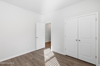 This inviting floor plan is designed for both comfort and on Harbour Point Golf Club in North Carolina - for sale on GolfHomes.com, golf home, golf lot