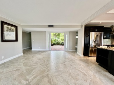 Beautifully renovated 2-bedroom, 2-bath 1st floor corner on Quail Ridge Golf Course and Country Club in Florida - for sale on GolfHomes.com, golf home, golf lot