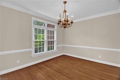 PRICE IMPROVEMENT to reflect cosmetic updates needed. GET INTO on Sedgefield Golf Course in North Carolina - for sale on GolfHomes.com, golf home, golf lot