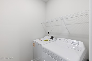 This inviting floor plan is designed for both comfort and on Harbour Point Golf Club in North Carolina - for sale on GolfHomes.com, golf home, golf lot