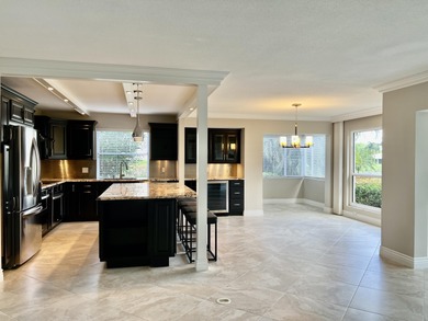 Beautifully renovated 2-bedroom, 2-bath 1st floor corner on Quail Ridge Golf Course and Country Club in Florida - for sale on GolfHomes.com, golf home, golf lot