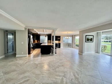 Beautifully renovated 2-bedroom, 2-bath 1st floor corner on Quail Ridge Golf Course and Country Club in Florida - for sale on GolfHomes.com, golf home, golf lot